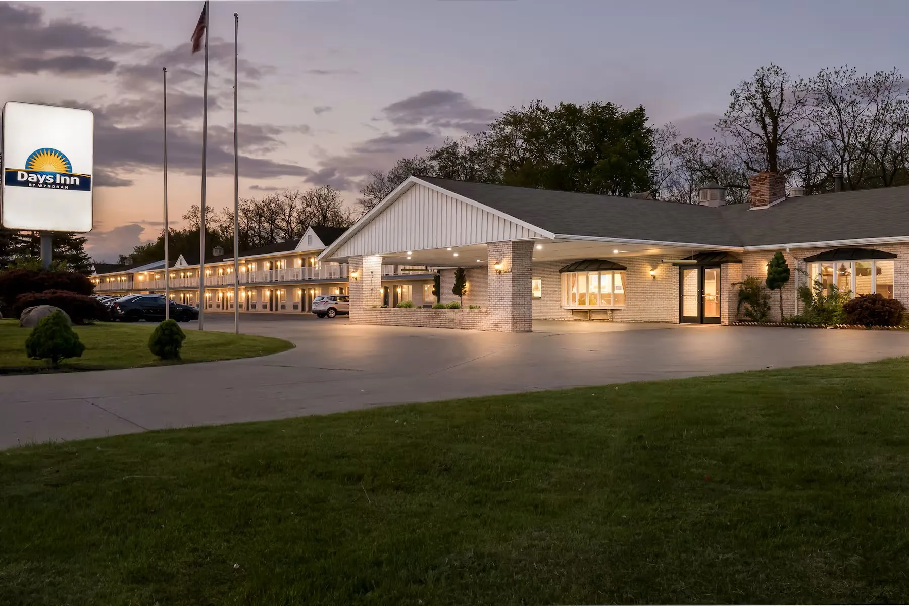 Days Inn by Wyndham Whitmore Lake exterior at Night view of hotel