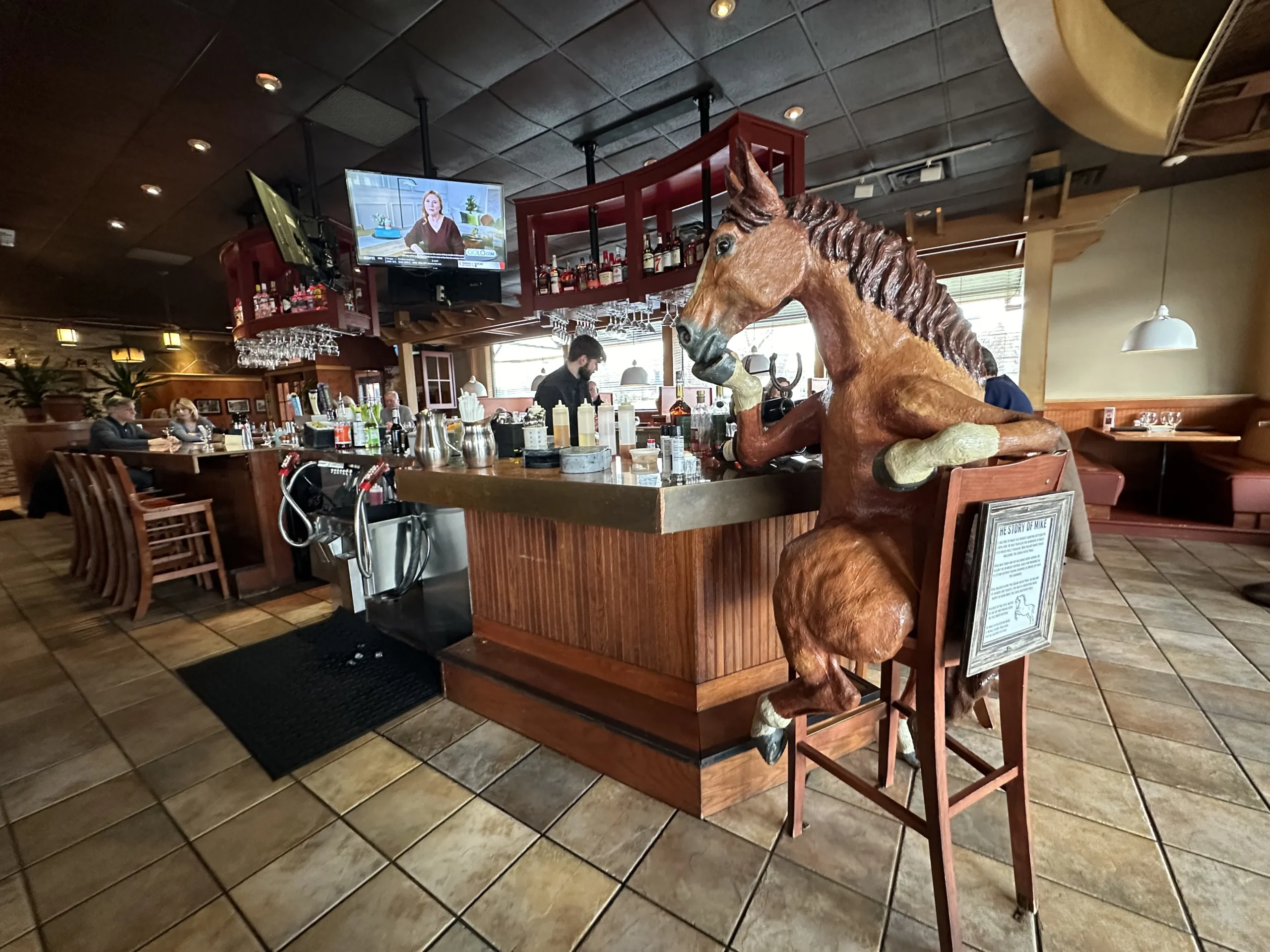 the bar at stillwater bar and grill featuring