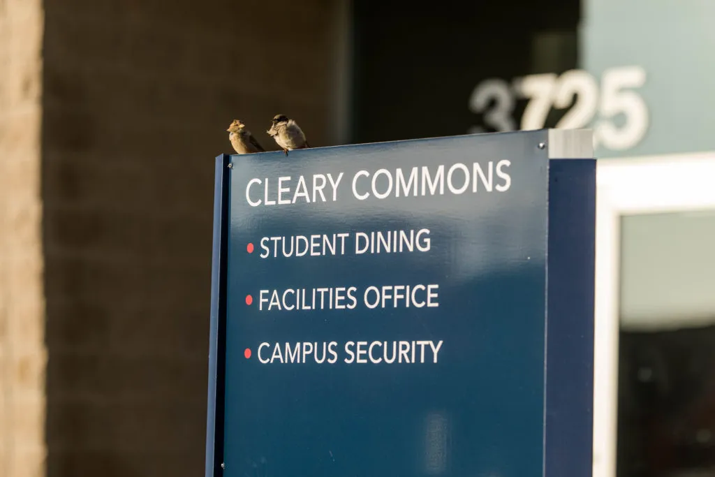 Cleary University signs for where to go in Howell.