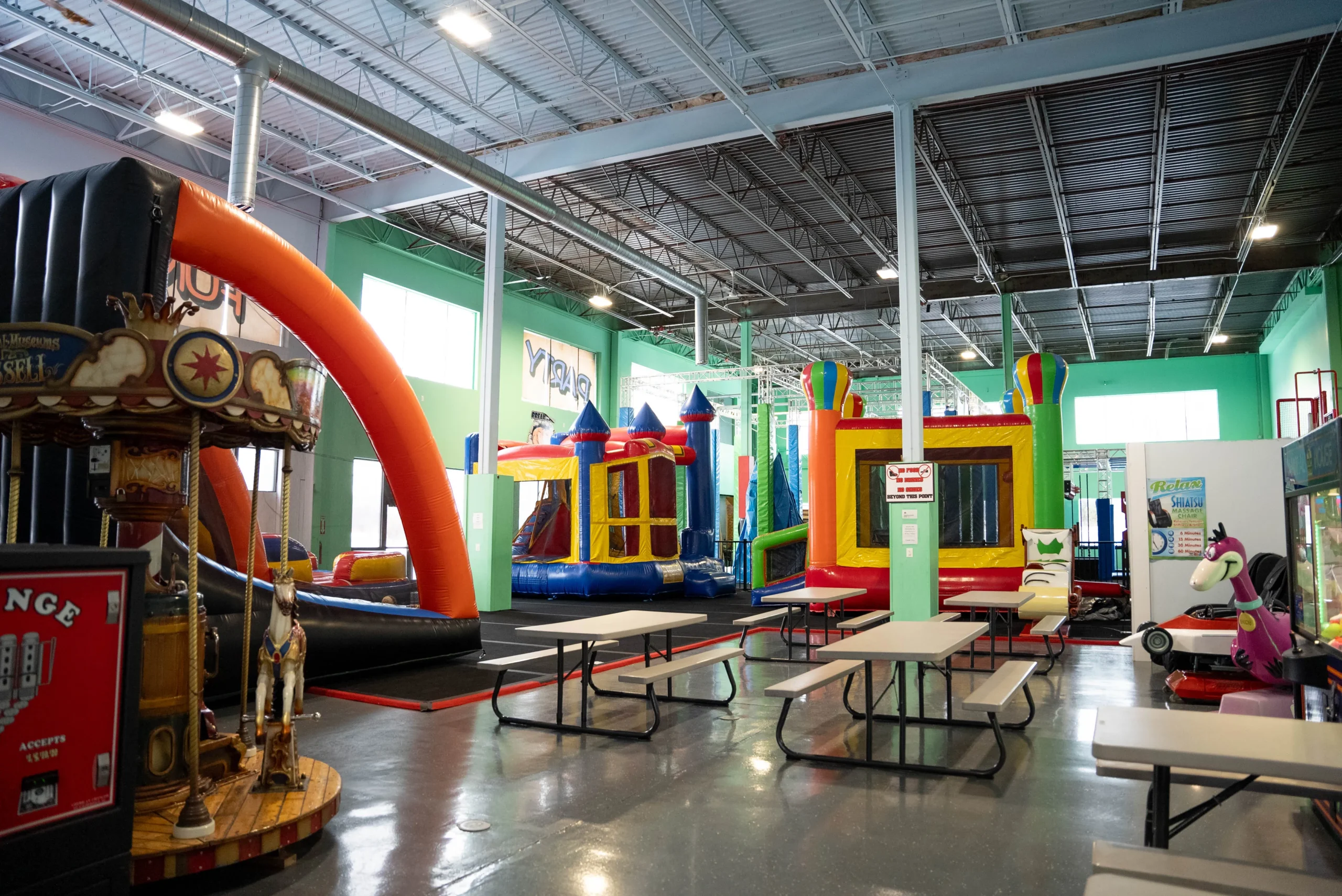 Castaway Play Cafe dining and blow up play area space.