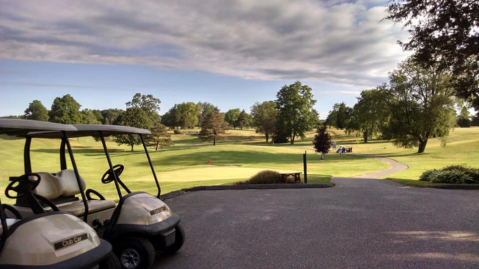 golf carts parked at Rush Lake Hills Golf Club