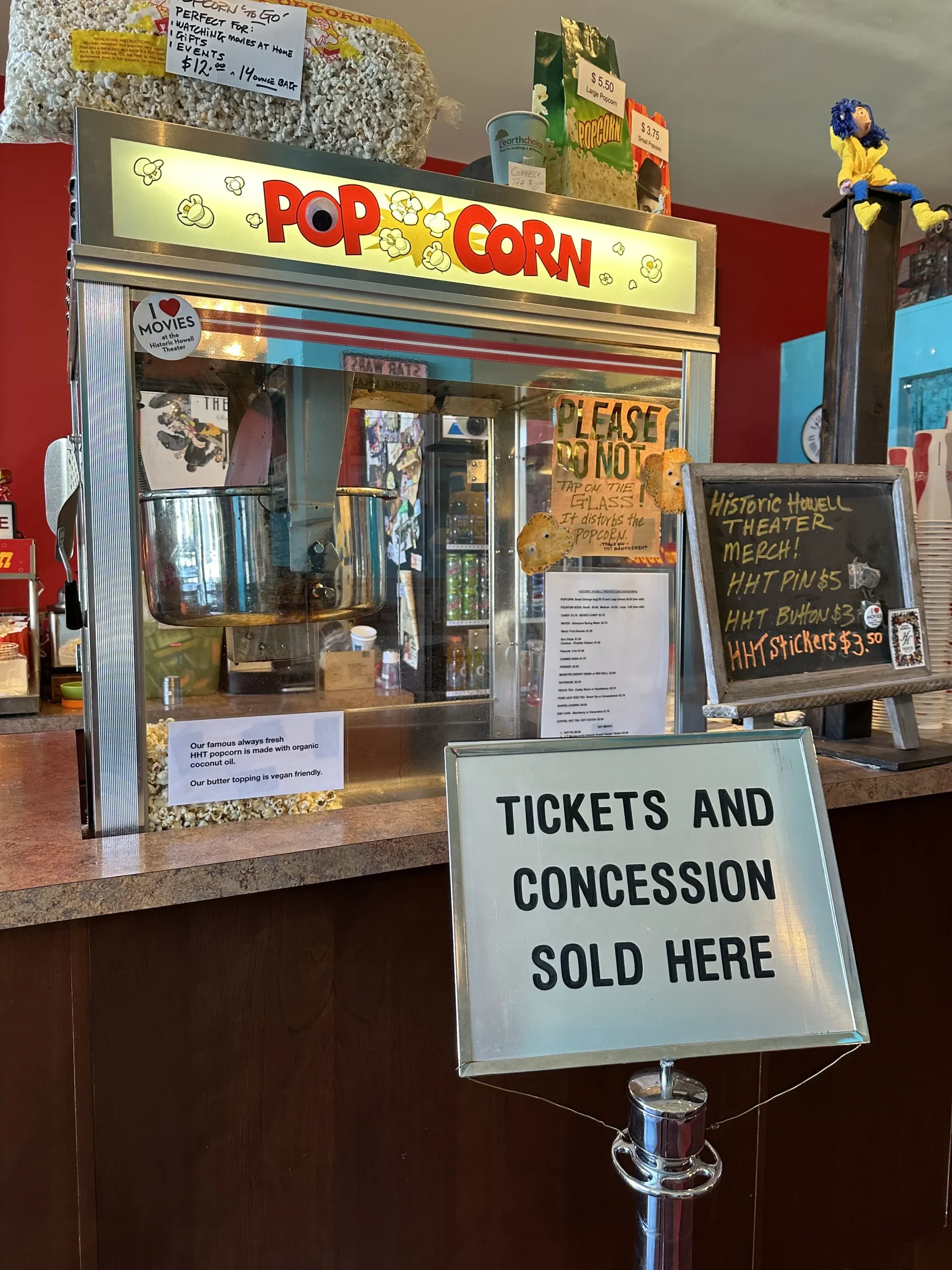 Historic Howell Theater concessions area with popcorn machine.