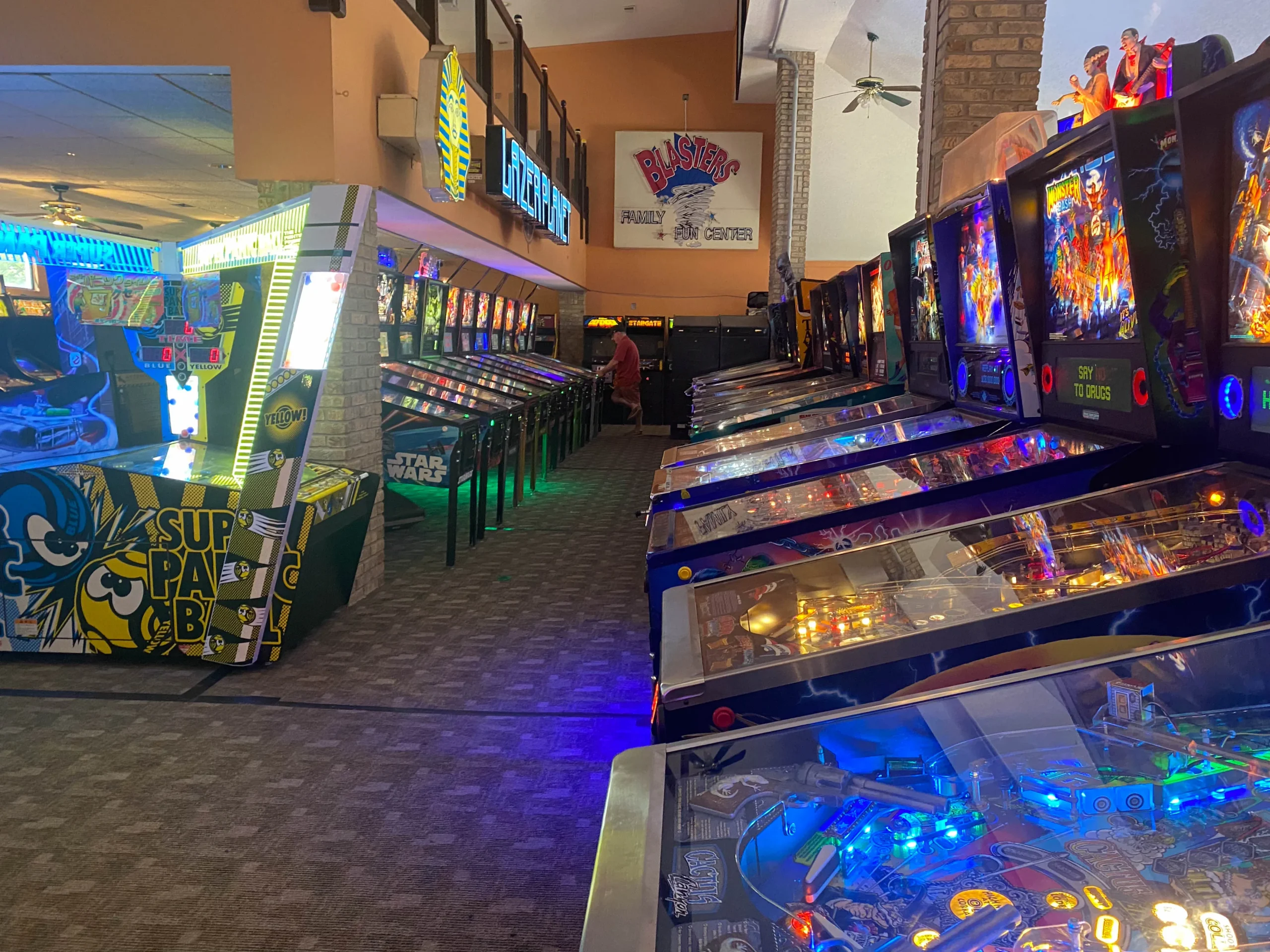The Arcade waiting area and pinball machines.