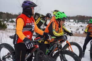 A group of bikers in the snow