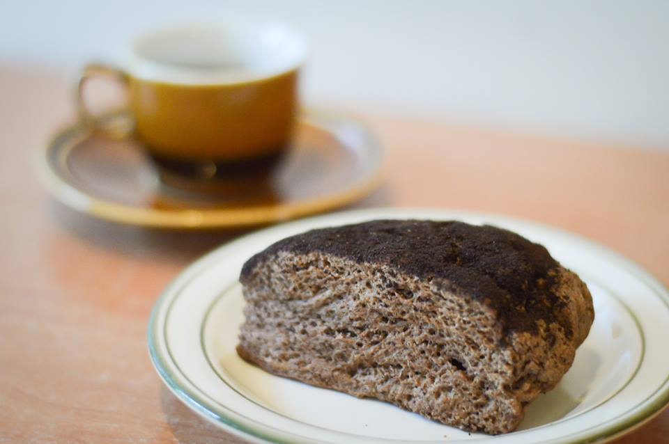 Peaberry Beans baked good and coffee mug