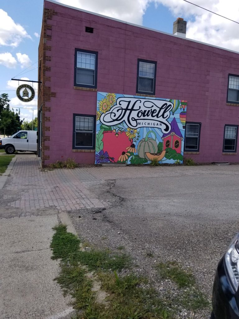 mural of howell with a heart and a melon
