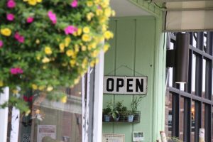 Open sign in front of Carriage House