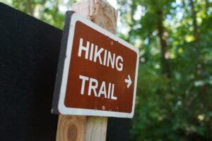 hiking trail sign in the brighton recreation area
