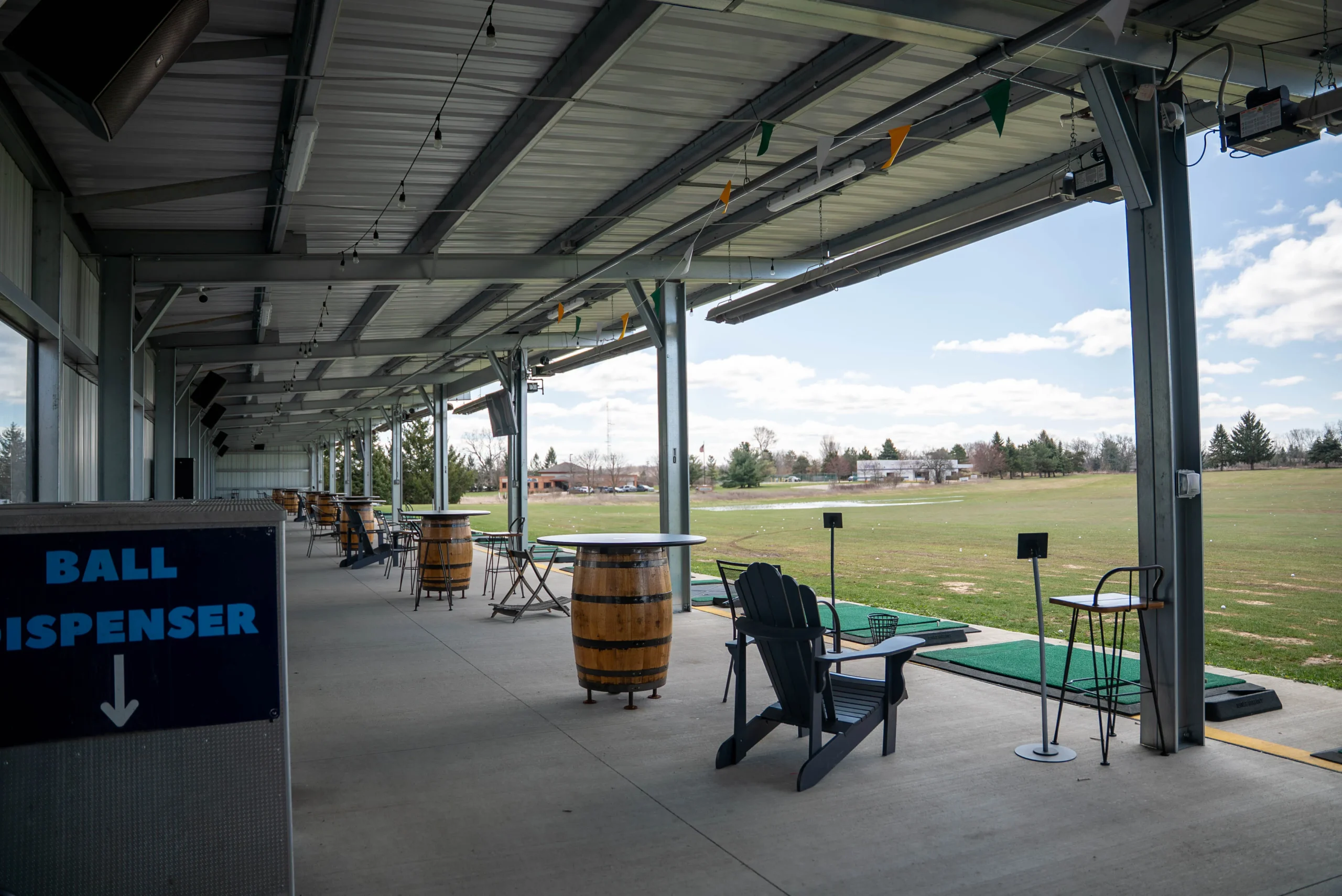 Tap-In's Range outdoor driving range golf area under range.