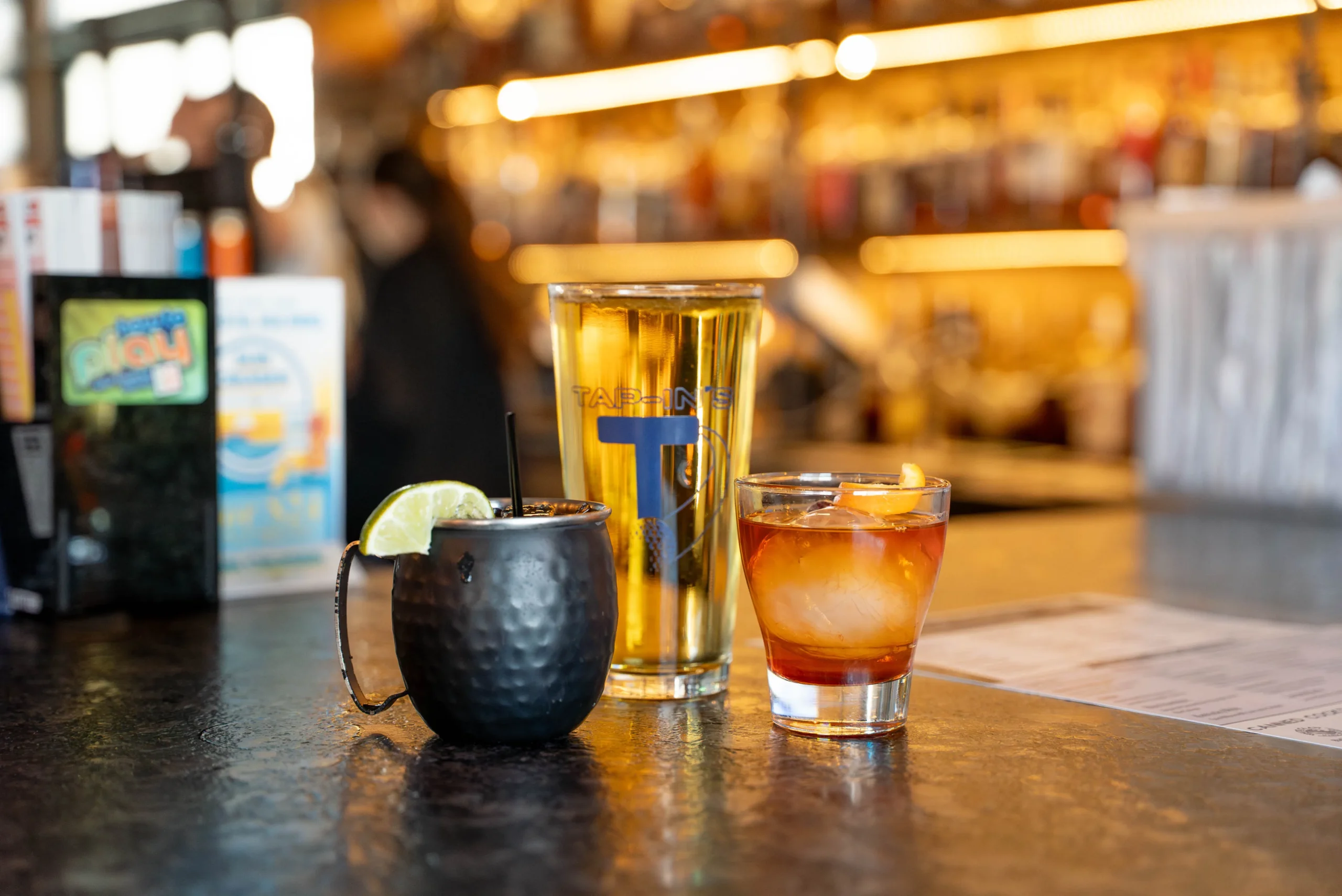Tap-In's Range drinks on counter at bar in Howell.