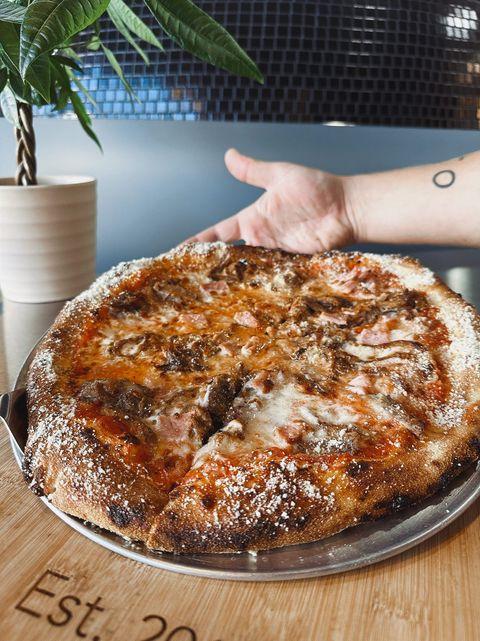 Captain's on main fresh cheese pizza fresh from the pizza oven