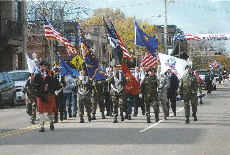 veterans walking in the brighton memorial day parade on memorial day in brighton michigan