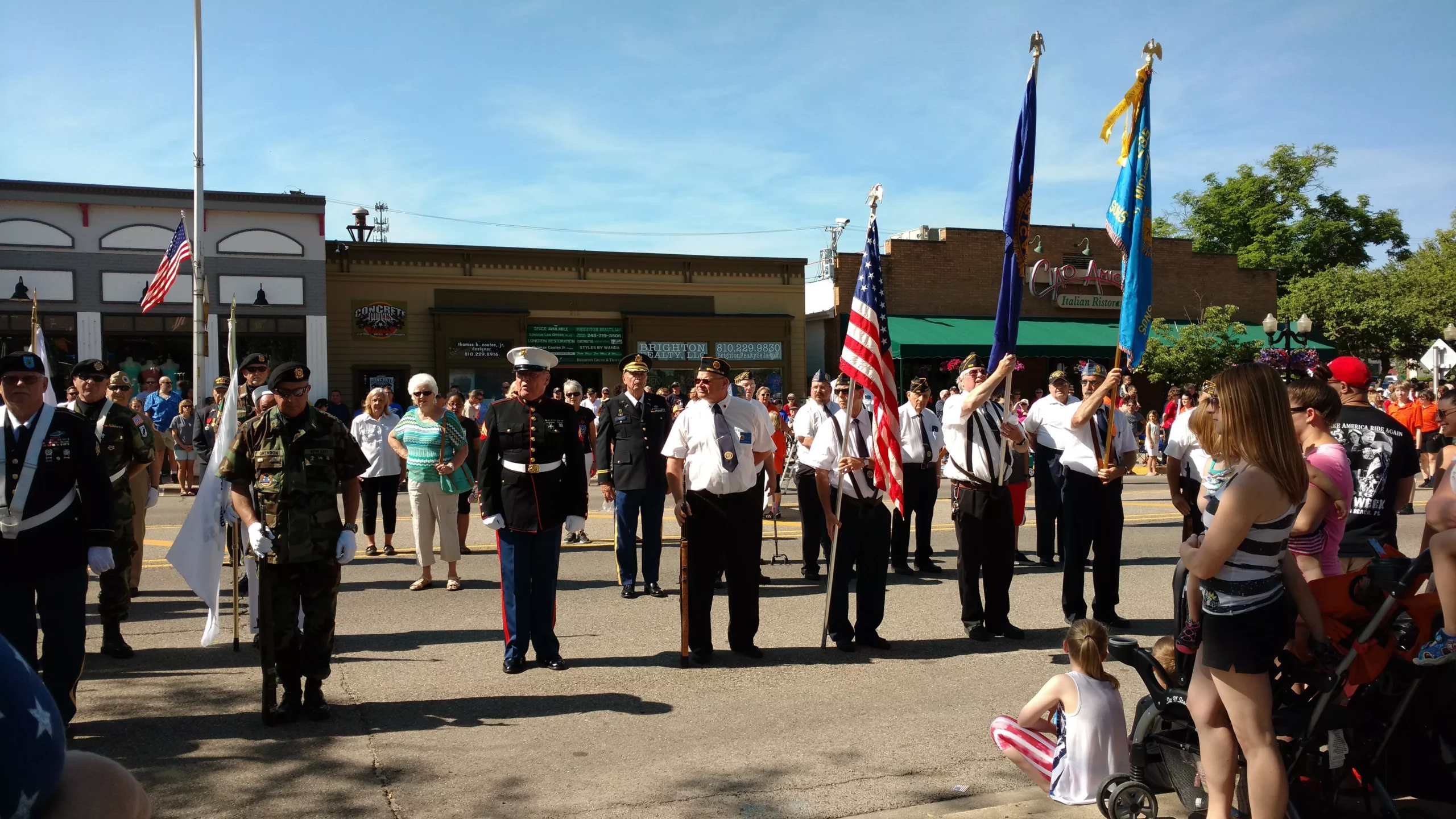 veterans walking in the brighton memorial day parade on memorial day in brighton michigan