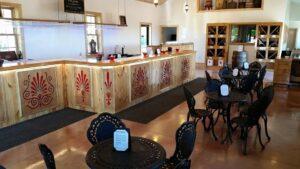 Inside Spicer's Winery and tasting room with table and bar
