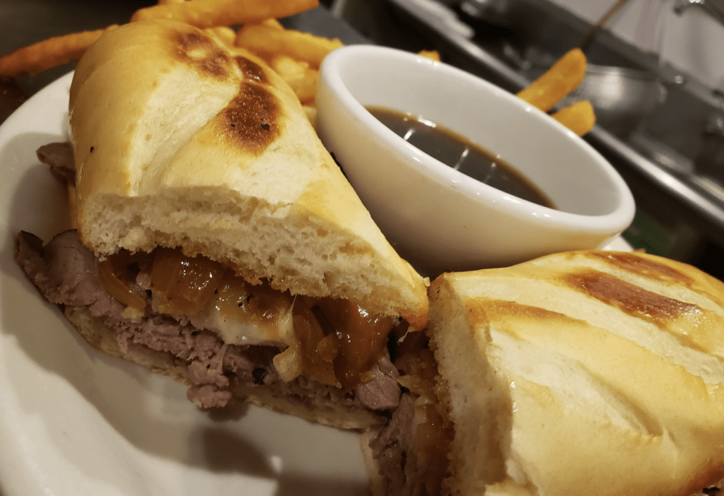 towering high french dip sandwich from local restaurant in hell michigan smittys hell saloon