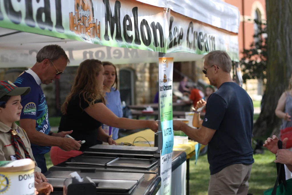 Grabbing a scoop of melon ice cream at the Howell Melon Festival