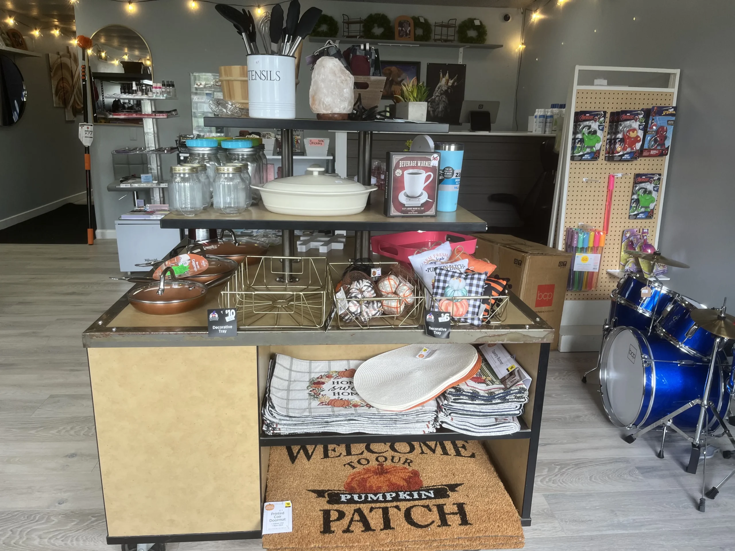 Assorted personal and decorative items on the shelves at Finders Keepers resale shop in Brighton.