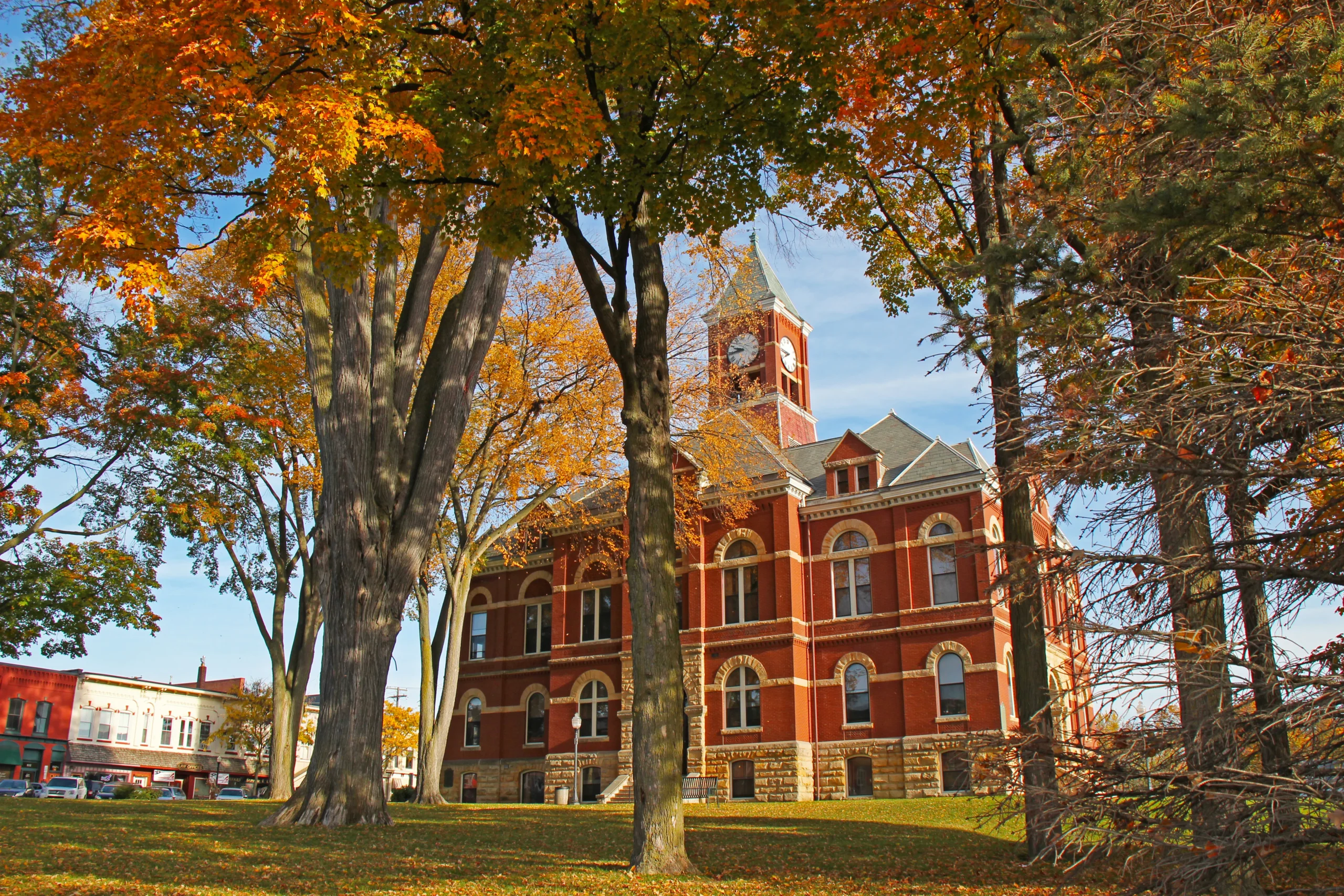 the historic howell courthouse on a crisp fall day surrounded by gorgeous autumn colors