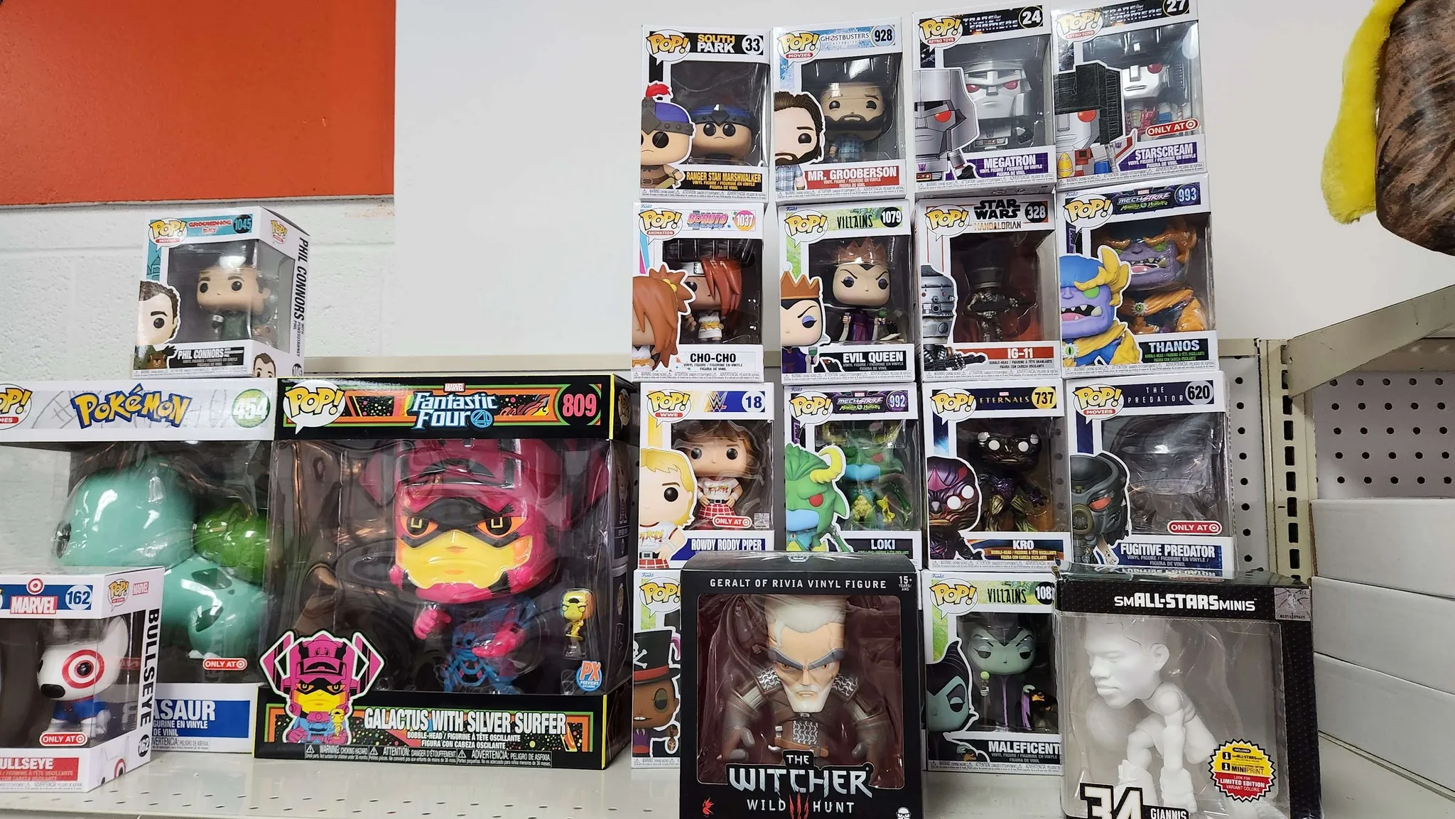 Moms Basement Games items and funkopop for sale on display.