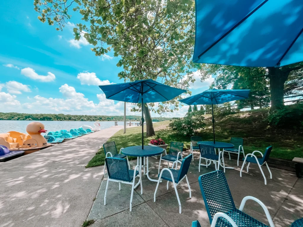 patio overlooking the waters of kent lake in kensington metropark