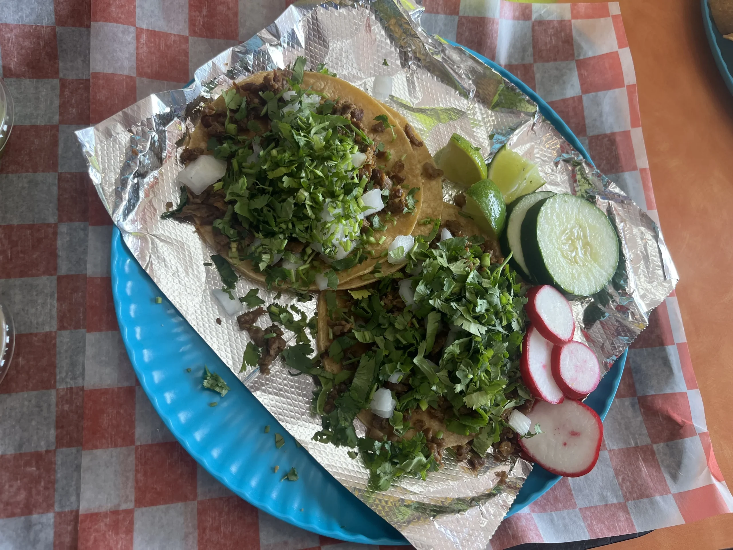 Happy Taco meal on a plate at restaurant in Brighton.