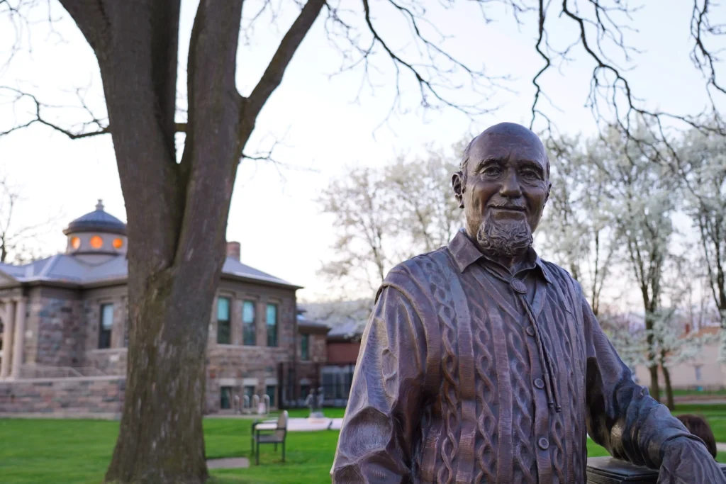 sculpture of Duane Zemper created by locals colin and kristine poole located outside howell cromaine library