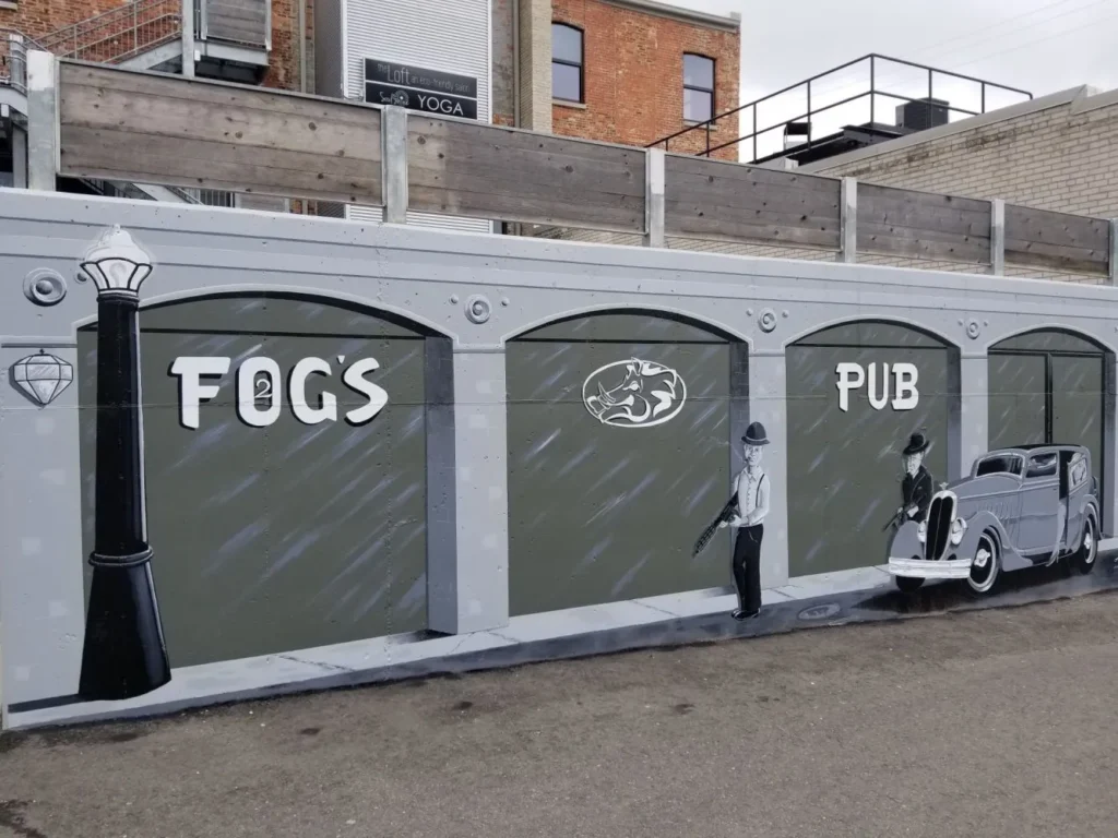 mural outside 2 fog's pub in downtown howell from local artist stacy karnes