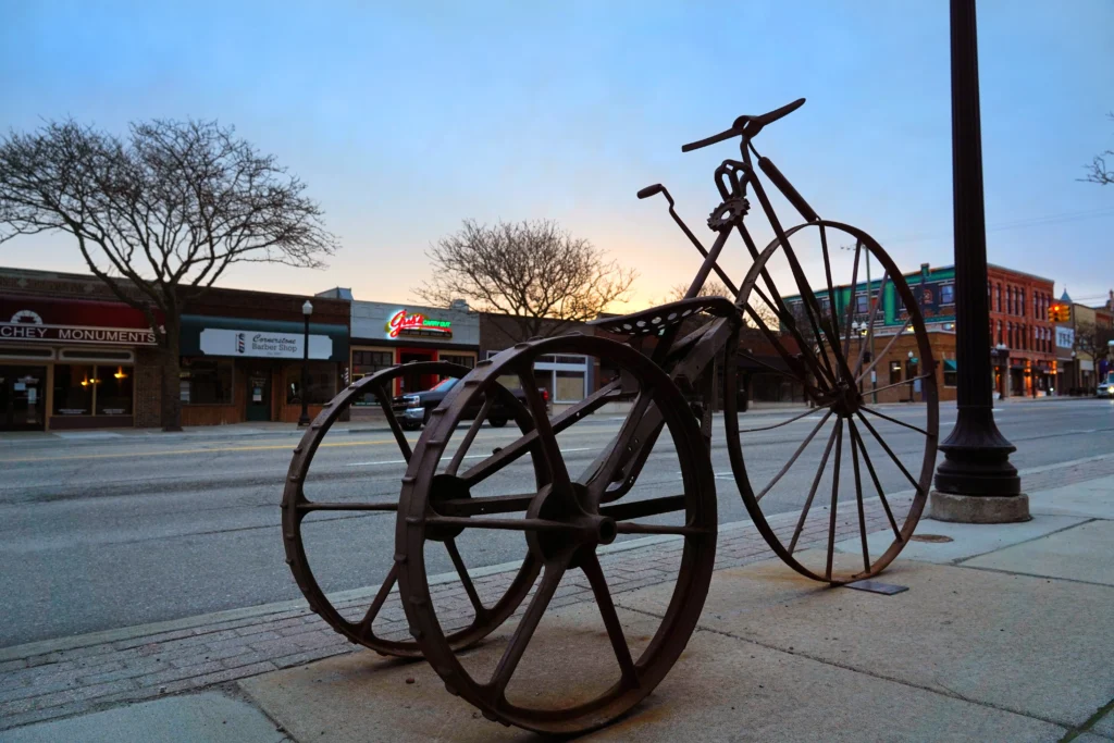 bike rack sculpture in downtown howell from artist jim roth