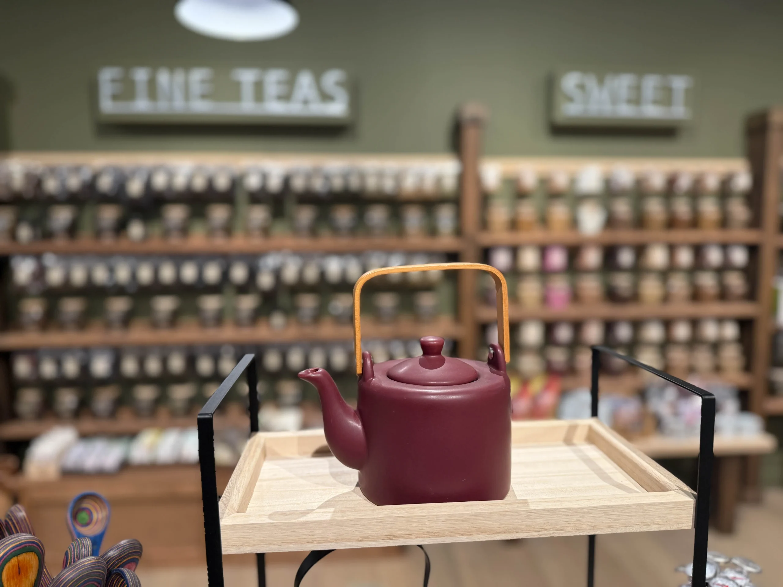 The Spice & Tea Exchange of Brighton teapot for sale on counter.