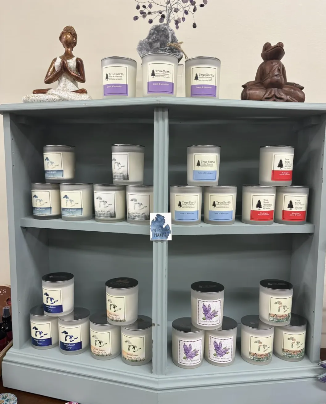 Sunshine and Sage downtown howell shop candles on display